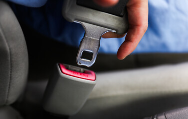 seat belt and buckle, symbolizing safety and accident prevention, a powerful image against drunk...