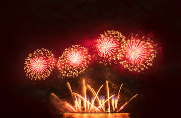 Colorful vibrant Firework celebrate anniversary happy new year 2024, 4th of july holiday festival. colorful firework in night time to celebrate national holiday. countdown new year party background