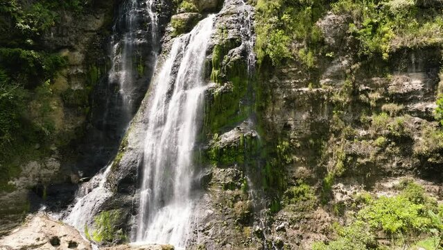 Waterfall in the mountains. Balea Falls. Negros, Philippines.