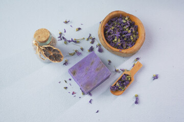 natural soap bar and dry lavender flower on table 