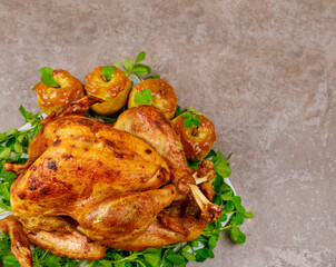 Thanksgiving dinner with a delicious baked turkey and apples.