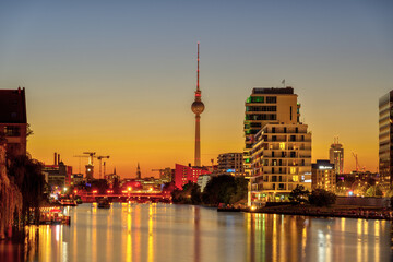 The famous TV Tower and the Spree river in Berlin after sunset