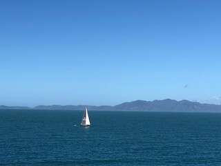 Sailboat boat sailing across a lake