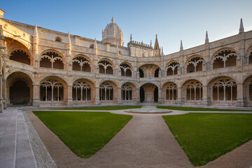 Jeronimos Monastery In Lisbon. Wide angle photo during sunset with the interior courtyard of this landmark church from Lisbon, Portugal.