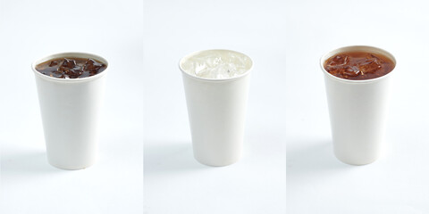 Soda beverage with ice cubes in paper cup, isolated in white background