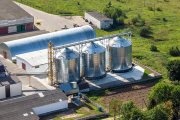 aerial panoramic view on agro-industrial complex with silos and grain drying line © hiv360