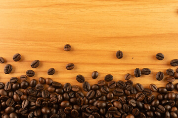 Coffee Beans on Wooden Background Isolated