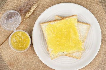 Fresh bread on white plate
