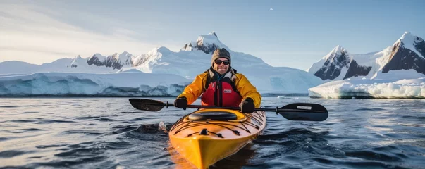 Foto op Canvas Winter kayaking , man paddling on sea kayak between icebergs.  Generative ai © alexanderuhrin