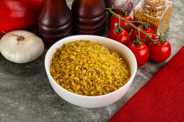 Dry wheat bulgur cereal heap