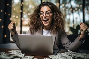 Foto op Plexiglas Happy young businesswoman celebrating achievement or online success while looking at laptop screen. © PRASANNAPIX