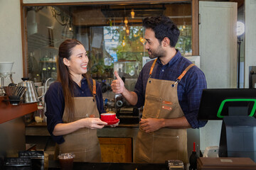Multicultural couple startup small business bakery cafe restaurant coffee shop wearing apron uniform together partnership, male female happy working opening food store teamwork, barista man and woman
