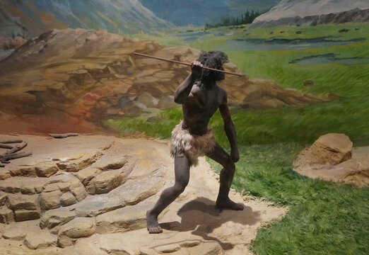 Ancient human model and natural backdrop paintings in museums which represents hunting in Hunting-Gathering Period.