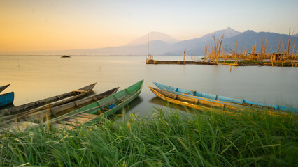 Fototapeta na wymiar beautifull sunrise or sunset lanscape view of rawa pening lake icon of banyubiru semarang city central java indonesia