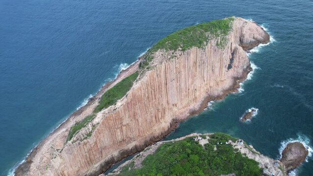 a hexagonal columns landscape in Hong Kong Geopark, at Sai Kung of Po Pin Chau island