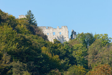 Fototapeta na wymiar View of the ruins of medieval Samobor Castle on the hill Tepec in the town of Samobor with a clear blue sky in the background, Croatia