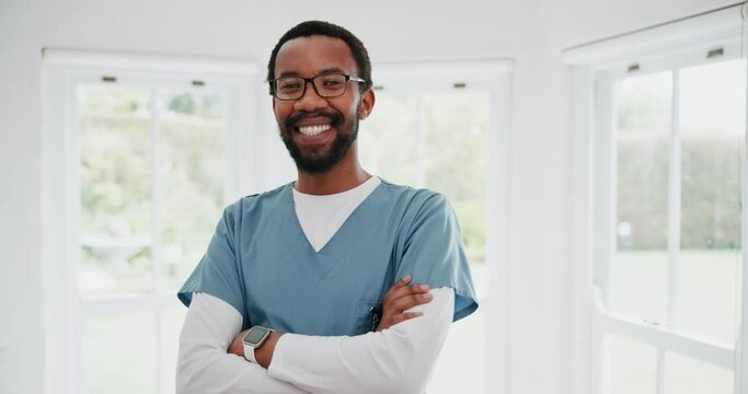 Face, black man and nurse with arms crossed, smile and pride for healthcare in hospital. Portrait, happy medical professional and confident African surgeon, employee in glasses and worker in Nigeria