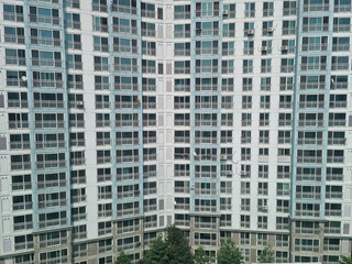 Close-up of an apartment full of windows.