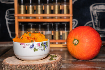 Pieces of baked pumpkin in a plate. Healthy food.