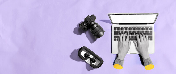 Laptop computer with a SLR camera and VR from above