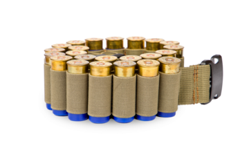 a pile of ammunition with a belt and a cartridges on a white background