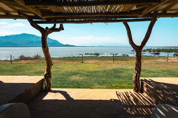 Scenic view of cabins at Lake Jipe Campsite in Tsavo West National Park, Kenya