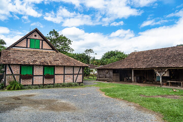 Fototapeta na wymiar Half-timbered house of german immigrants in the countryside of Pomerode, Santa Catarina in Brazil