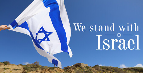 Waving flag of Israel outdoors. Israel-Hamas war