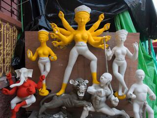 Unfinished idol of Hindu Goddess Durga with use of selective focus 