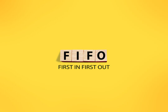 FIFO first in out, text words typography written on wooden letter, life and business motivational inspirational