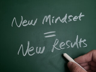 New mindset results, text words typography written on chalkboard, business education and self...