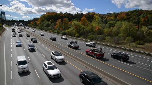 Aerial view of the Don Valley Parkway traffic with autumn leaf colour.