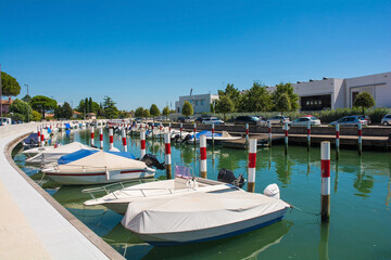 Fototapeta na wymiar The marina in Aquileia in Friuli-Venezia Giulia, north east Italy. August