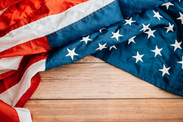 Aged American flag in closeup, symbolizing democratic values and patriotic honor for our nation's Veterans.