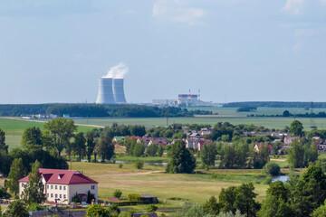 Cooling towers of nuclear power plant against the blue sky