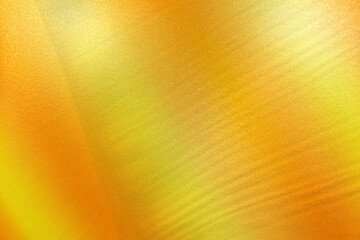 Light brown orange gold yellow silk satin. Color gradient. Golden luxury elegant abstract background. Shiny, shimmer. Curtain. Drapery. Fabric, cloth texture. Christmas, autumn.