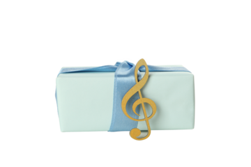 PNG,Musical, golden treble clef with a gift, isolated on white background