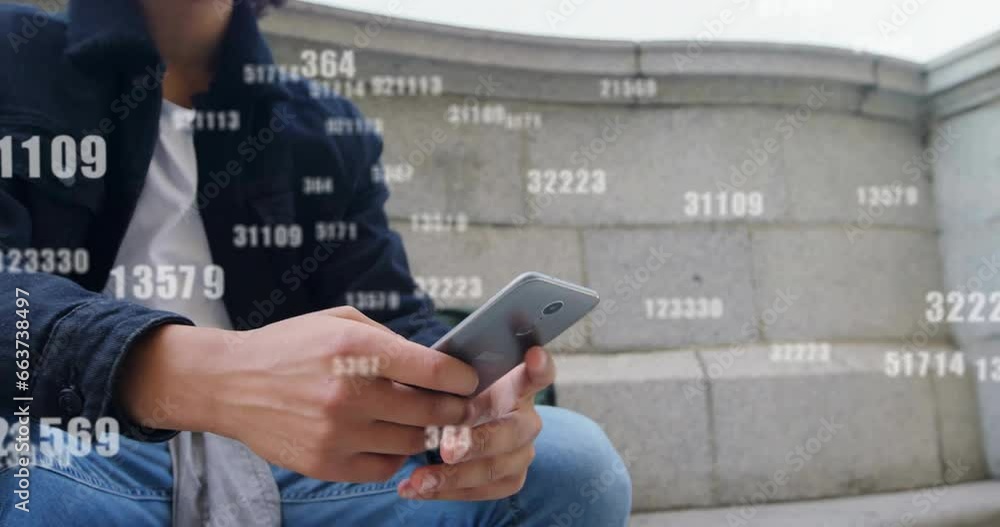 Aufkleber animation of falling changing numbers over biracial man scrolling on smartphone in outdoors