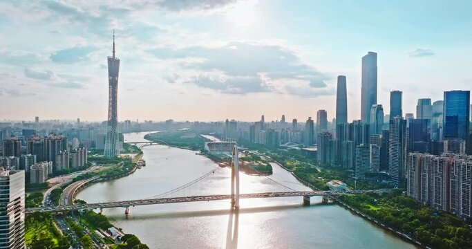 Aerial view of Guangzhou city financial district skyline at sunrise. Removed building trademark and advertising