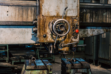 Old equipment, machines, tools in a rustic style in an abandoned mechanical factory