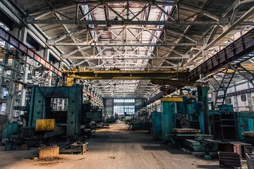 Keuken spatwand met foto Old equipment, machines, tools in a rustic style in an abandoned mechanical factory © Дмитро Петрина