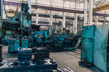 Old equipment, machines, tools in a rustic style in an abandoned mechanical factory