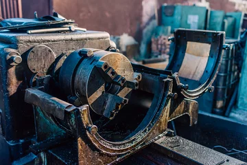 Foto op Canvas Old equipment, machines, tools in a rustic style in an abandoned mechanical factory © Дмитро Петрина