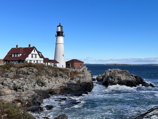 Fototapeta na wymiar Lighthouse on the coast 
