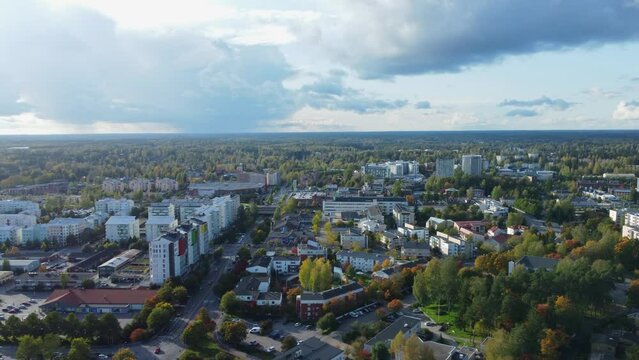 Low aerial flyover of forested Scandinavian city of Kerava, Finland