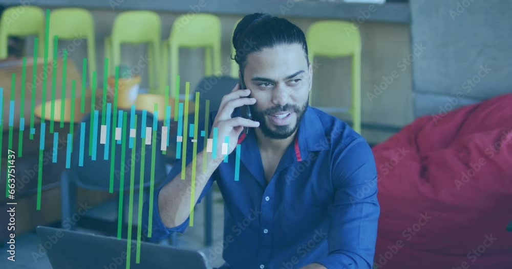 Poster animation of multiple graphs over smiling biracial man with laptop talking on smartphone