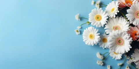 Foto op Plexiglas Romantic, flower banner with bouquet of gerberas and gypsophila on a light blue background with copy space. © Влада Яковенко