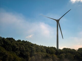 Wind power plant rotor close view. Windpower generator. Green energy, eco friendly industry concept