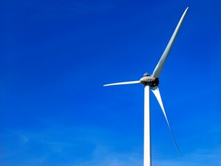 Wind power plant rotor close view. Windpower generator. Green energy, eco friendly industry concept