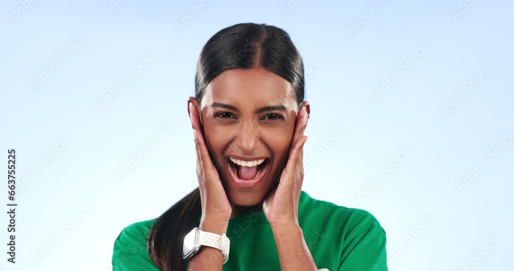 Wall mural Volunteer woman, face and wow in studio with hands, shock or surprise with social responsibility by blue background. Girl, NGO worker and excited for deal, achievement or success in community service